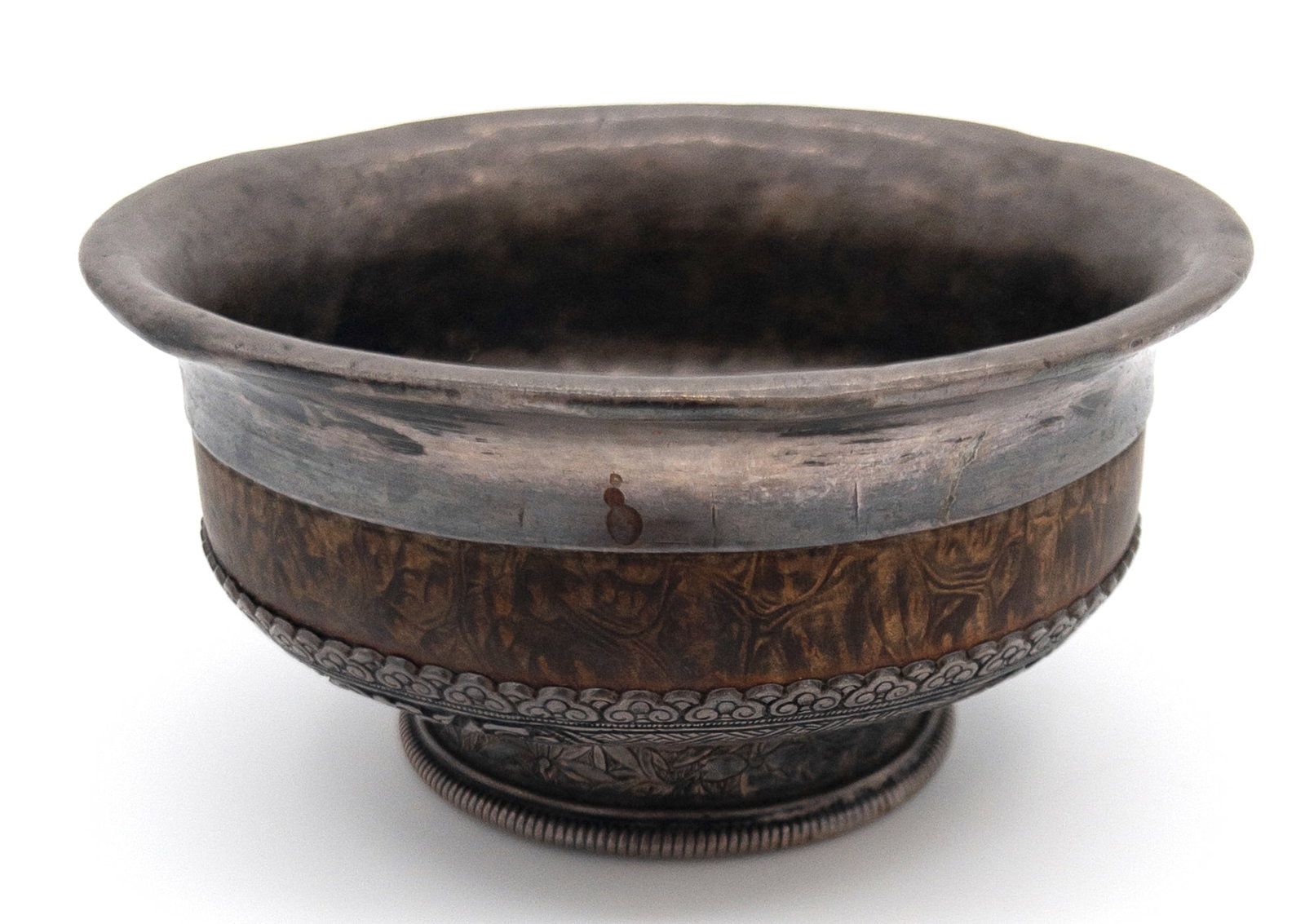 Tibet Silver and Burlwood Footed Tea Bowl: Tibet Silver and Burlwood Footed Tea Bowl. Good original condition with wear from age and use. Measures appx 2 1/2" tall x 5" across.