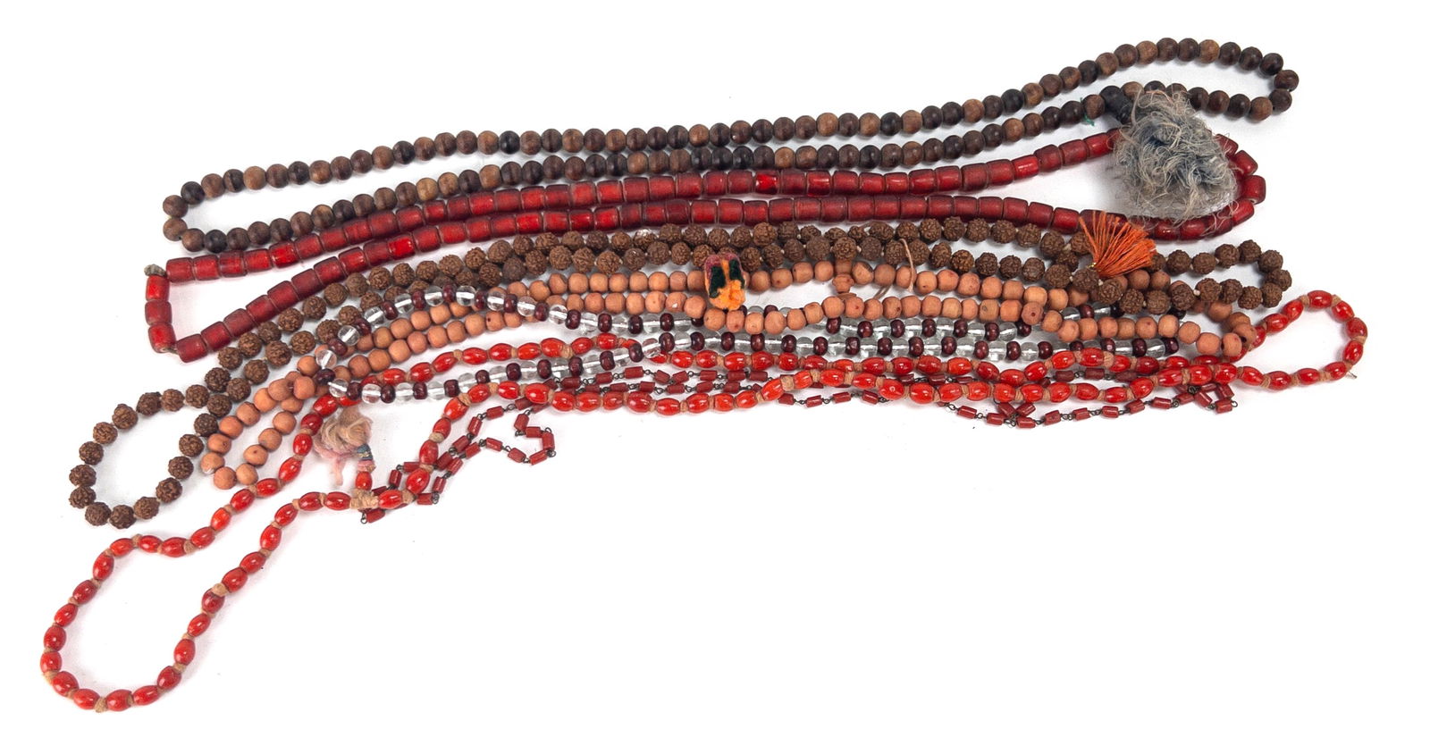 Lot of 7 Buddhist and Near Eastern Prayer Necklaces: Lot of 7 Buddhist and Near Eastern Prayer Necklaces. Longest measures appx 36" in circumference.