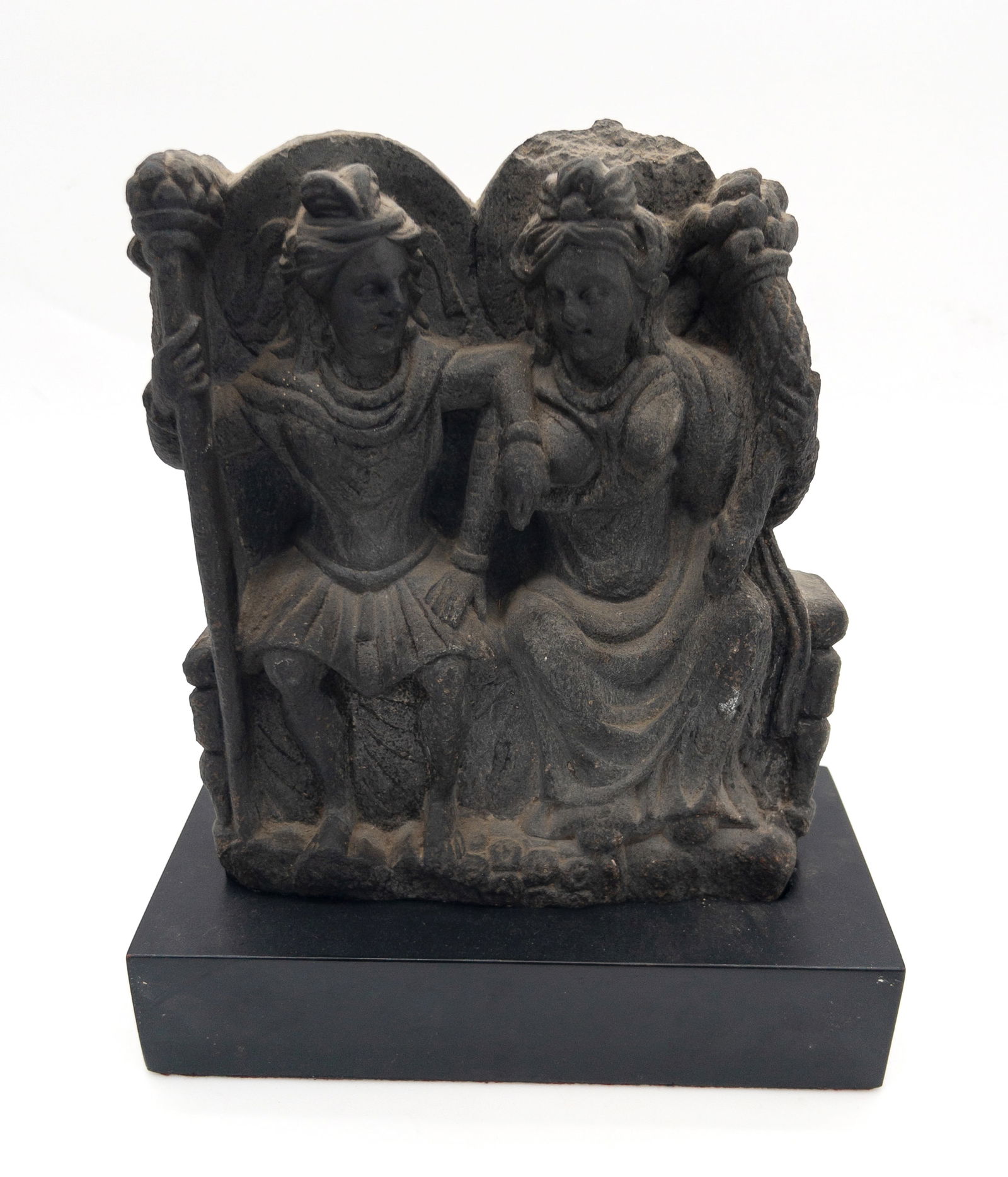 2nd-3rd C. Gandharan Buddhist Black Schist Relief Sculpture: 2nd-3rd C. Gandharan Buddhist Black Schist Relief Sculpture. Typical wear from age and use. Complete stone with fitted stand. Measures appx 7 1/2" tall x 7" wide x 3" deep, and 9 1/4" tall on stand.