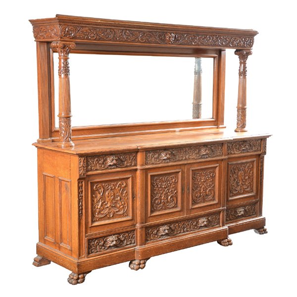 American Victorian Mirrored Oak Sideboard: American Victorian Mirrored Oak Sideboard, with tiger paws, north wind faces, acanthus leaves and berries. Lower configuration consists of three drawers with four cabinet doors and three lower drawers