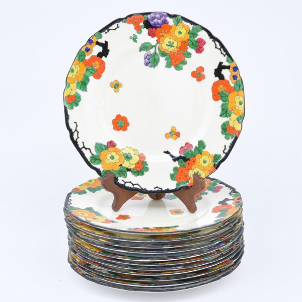 Set of 12 Royal Doulton China Plates, 9": Set of 12 Royal Doulton China Plates, 9", cream colored ground, with scalloped black rim, and colorful floral and berry clusters on branches, marker's mark and seller at bottom, Marshall Field & Compa