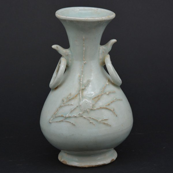 Chinese Pale Blue Double Loop Handle Vase: Chinese Pale Blue Double Loop Handle Vase, early earthenware, with raised floral decoration , 8 1/2"h.