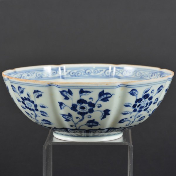 Chinese Lobed Blue/White Bowl: Chinese Lobed Blue/White Bowl, thinly potted with eight lobed sides and rim, painted with various flowering sprays on the exterior, and a lotus sprig inside, base with inscriptions, 8.2"d.