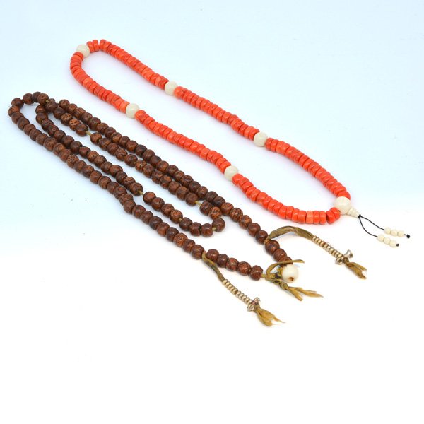 Two Tibetan Buddhist Prayer Beads: Two Tibetan Buddhist Prayer Beads, 108 coral beads interspaced with larger ivory beads, and 108 Jingang puti seeds and coral beads, 46"l.