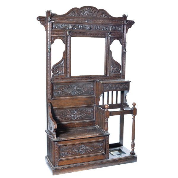 Victorian Hall Seat: Victorian Hall Seat, oak, ornately carved, with small bench, beveled mirror, umbrella caddy and shelf, 81" h x 46" w x 17 1/2"d, good original condition.