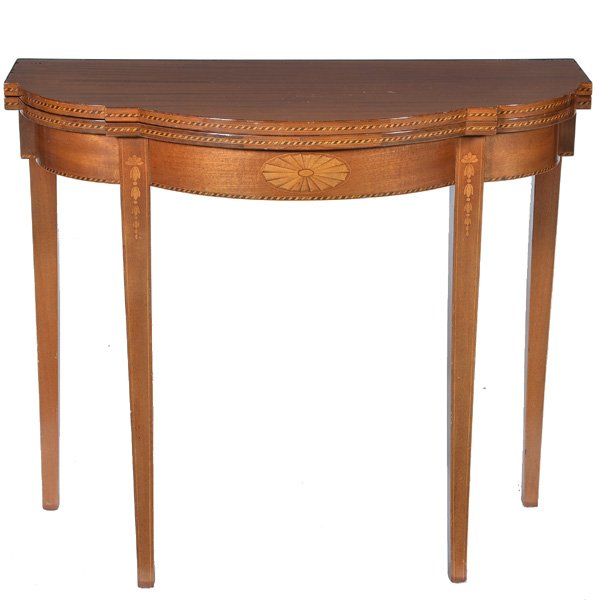 American Mahogany Games Table: American Mahogany Games Table with multi wood inlay, scallop shaped front, and bell flower design on legs, 31" h x 36" w x 18" d, 36" d (open), good original condition.