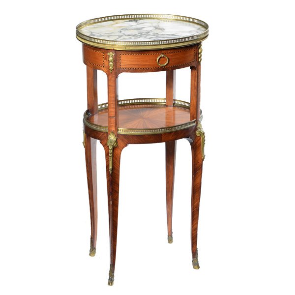 French Double Tier Oval Side table, 19th C: French Double Tier Oval Side table, 19th C, multi wood marquetry inlay, with cream colored marble top and pierced brass gallery and foliate ormolu mounts, upper square supports interrupted by a shelf
