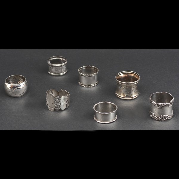 Lot of Sterling Napkin Rings: Lot of sterling napkin rings, (6) various designs with maker's marks and stamped "sterling", (1) stamped D. Roussel and French mark, total approximate weight 5.29 ozt, good condition.