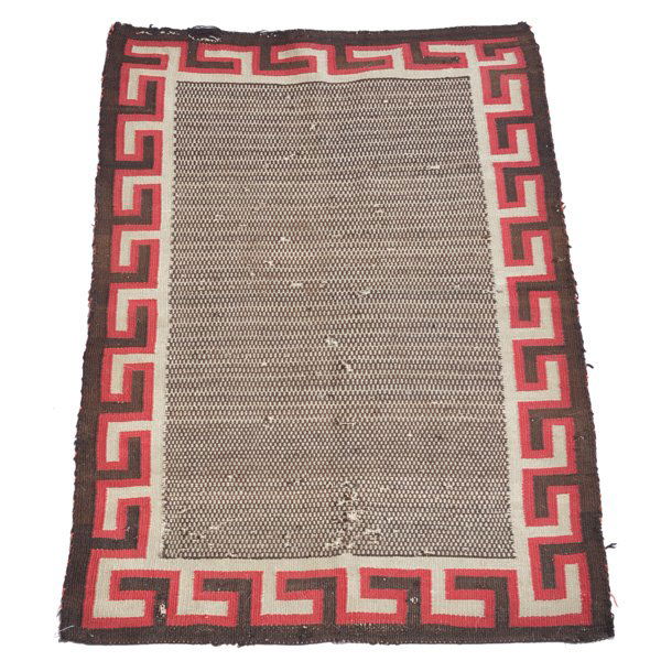 Navajo Rug, Border and Small Weave Center: Navajo Rug, geometric border of red, brown and ivory with small weave pattern center, 4' 0" x 2' 9", holes in center and fraying at ends.