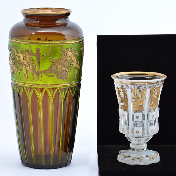 Val St. Lambert and Bohemian Glass Vases: Val St. Lambert and Bohemian glass vases. The Bohemian vase with white and clear cut back decoration with dolphins, 6 1/2" x 3 1/2" dia, flake chip to rim with minor rub to gilding. The Val St. Lamber