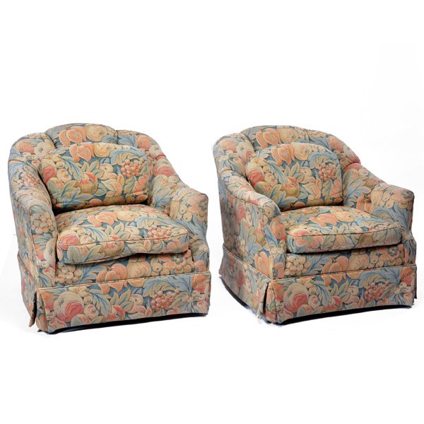 Pair of Upholstered Barrel Shape Chairs: Pair of upholstered barrel shape chairs, fruit and leaf pattern tapestry style fabric with loose seat and back cushion, skirted bottom, 33" h x 34" w x 36" d, good condition.