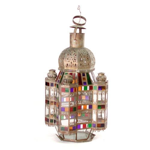 Turkish 19th C. Lantern.: LANTERN. Turkish 19th C. lantern with multiple sides and stained glass. Has pierced tin crest and chimneys. Door on side opens to insert a lantern. 14 1/2" x 14 1/2" x 30". One piece needs re-solderin