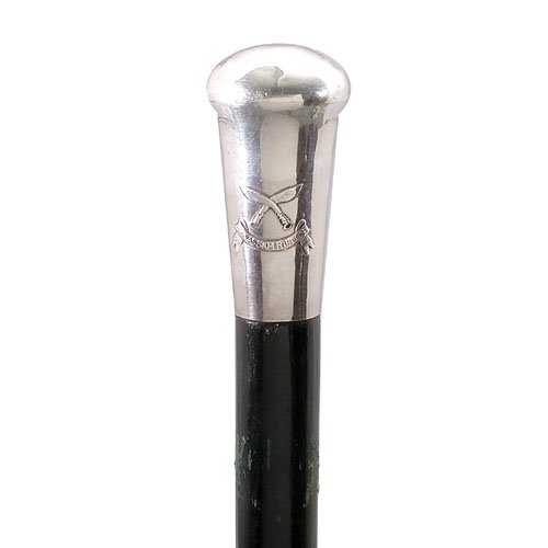 "Assam Rifles" Military Cane.: MILITARY CANE. Silver knob with marked sterling "Assam Rifles" in relief and crossed machetes on leather covered shaft ending with a large silvered ferrule. 36". Very good condition.