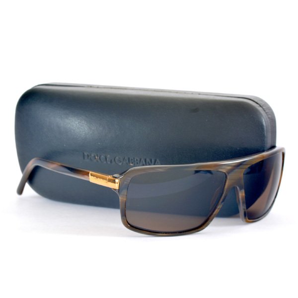 Mens Dolce & Gabbana Sunglasses: Mens Dolce & Gabbana tortoise sunglasses with gold hallmarked accents at temples, good condition, retains original case and guarantee of authenticity card.