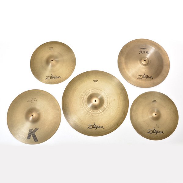 Group of Zildjian Cymbals: Group of Zildjian Cymbals to include: 16" Rock Crash, stamped on reverse "Modern Drum Shop LTD. New York City", 16" Thin Crash, 18" "K" Dark Crash Custom, 18" China Boy High and 22" Medium Ride.