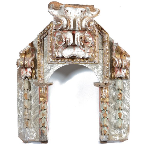Hand Carved Spanish Architectural Niche: Hand Carved Spanish Architectural Niche, composed of 17th and 18th c elements, gilt and polychrome decorated, the carved scrolling cornice over flanking sides, paint decorated, 49"h x 38"w, some resto