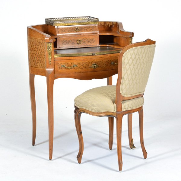 French Style Circular Ladies Writing Desk and Chair: French style circular ladies writing desk with cross hatching multiwood marquetry inlay, fitted interior and pull out writing surface on cabriole legs and ormolu mounts, 38 1/4" h x 29" w x 21" d, ven