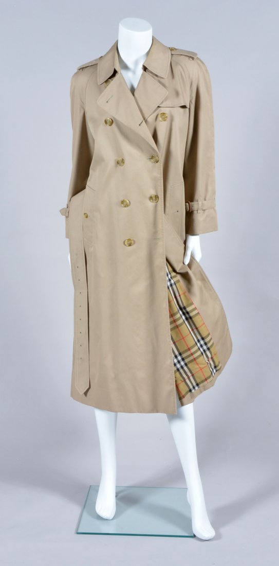 Burberry Nova Check Trench Coat: Iconic Burberry trench coat, Nova check lining, double breasted with epaulets and belt, size M, missing buttons.
