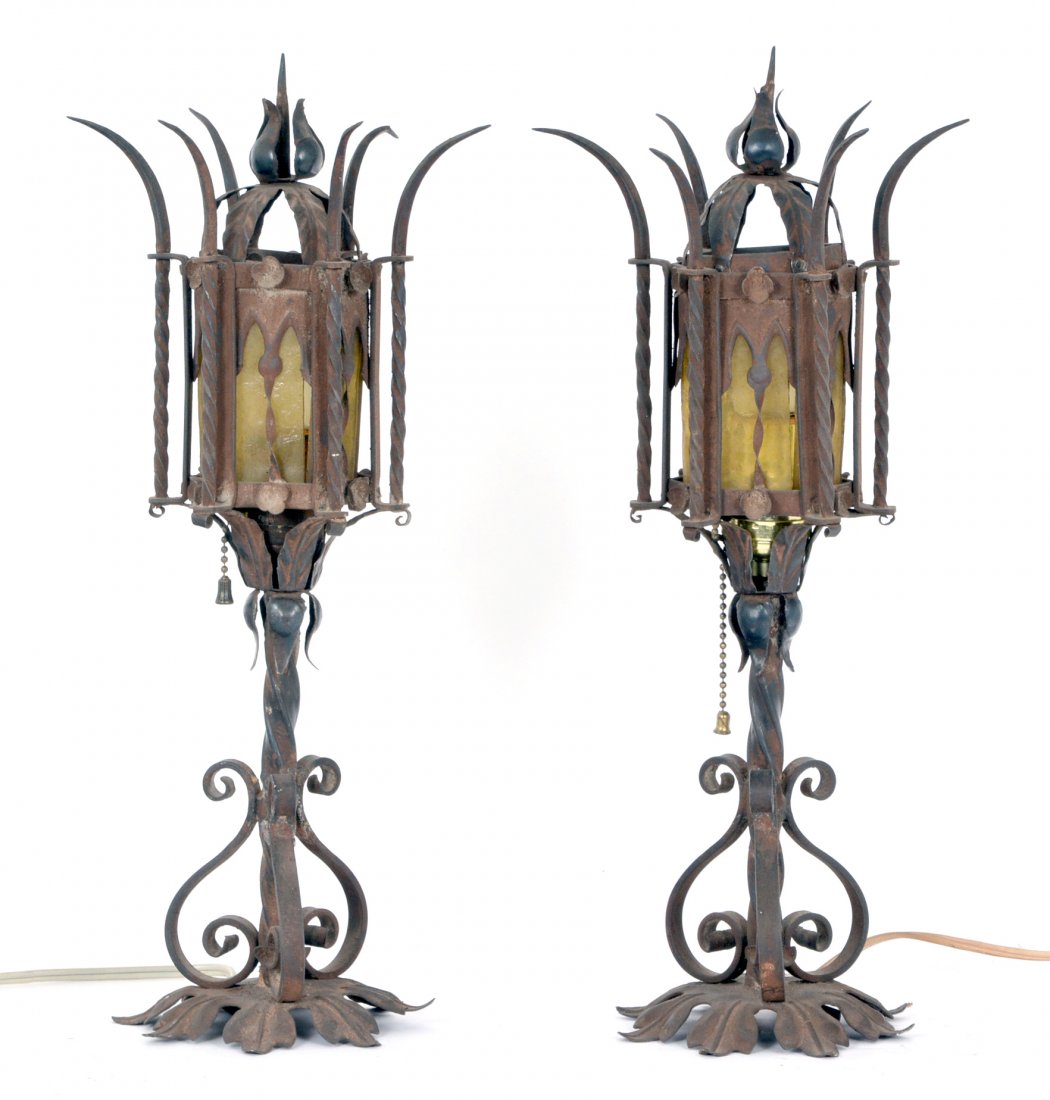 Pair of Gothic wrought iron table lamps, 16.5" tall: Pair of Gothic wrought iron table lamps with amber glass shades, 16.5" tall. Very good original condition.