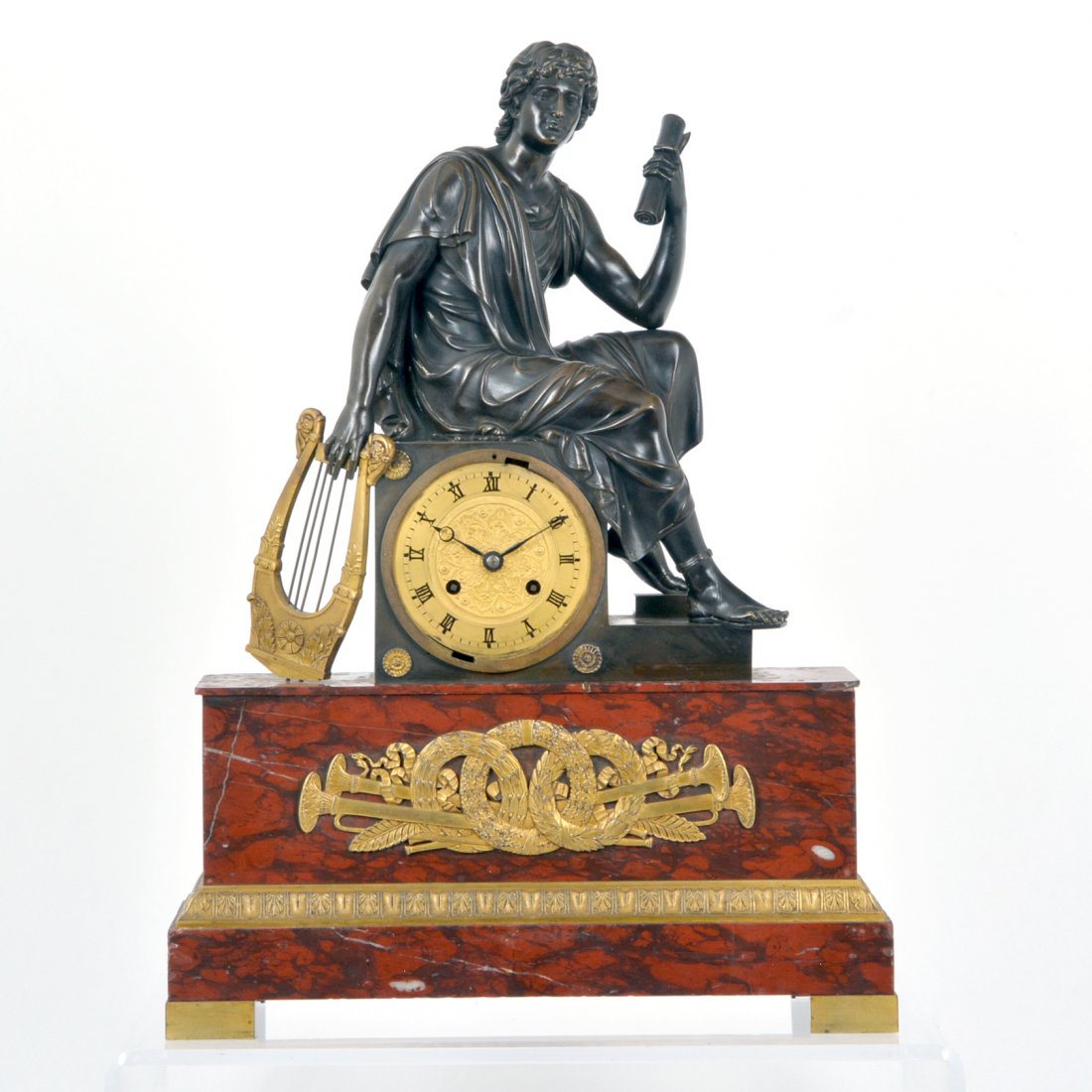 French bronze figural mantle clock, rouge marble base: French bronze & gilt bronze figural mantle clock with neoclassical musician holding a harp atop a bronze clock on rouge marble ormolu mounted base, early 19th c with silk escapement, 18.5"h x 14.5"w x