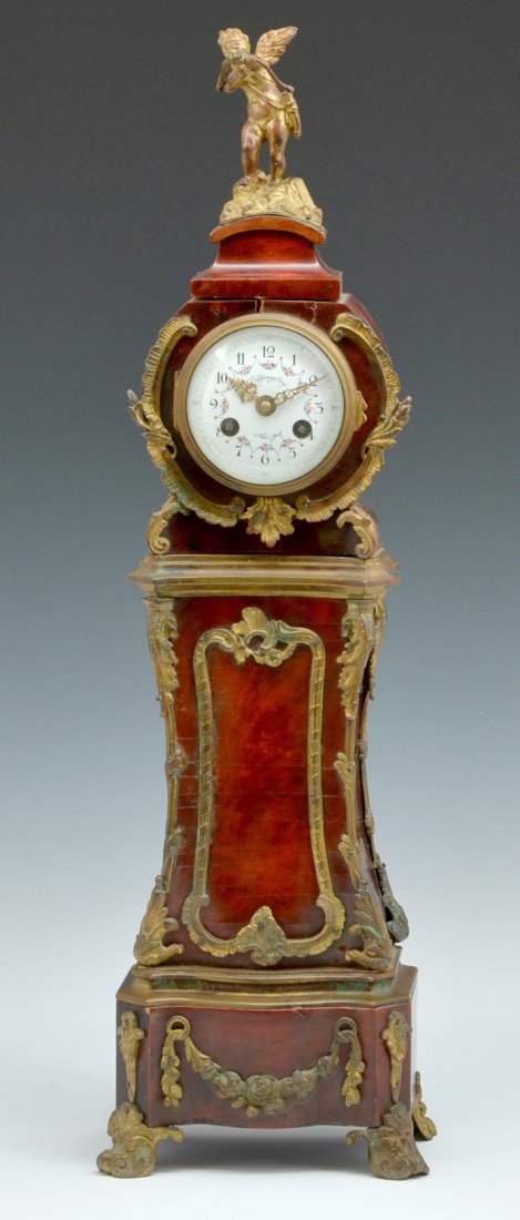 Tiffany & Co ormolu & shell cased mini-tall clock, 22"t: Tiffany & Co ormolu mounted shell cased miniature tall clock with Cupid Finial, porcelain floral decorated dial marked "Tiffany & Co., New York", movement by Vincenti et Cie, 1855 and also marked "Tif