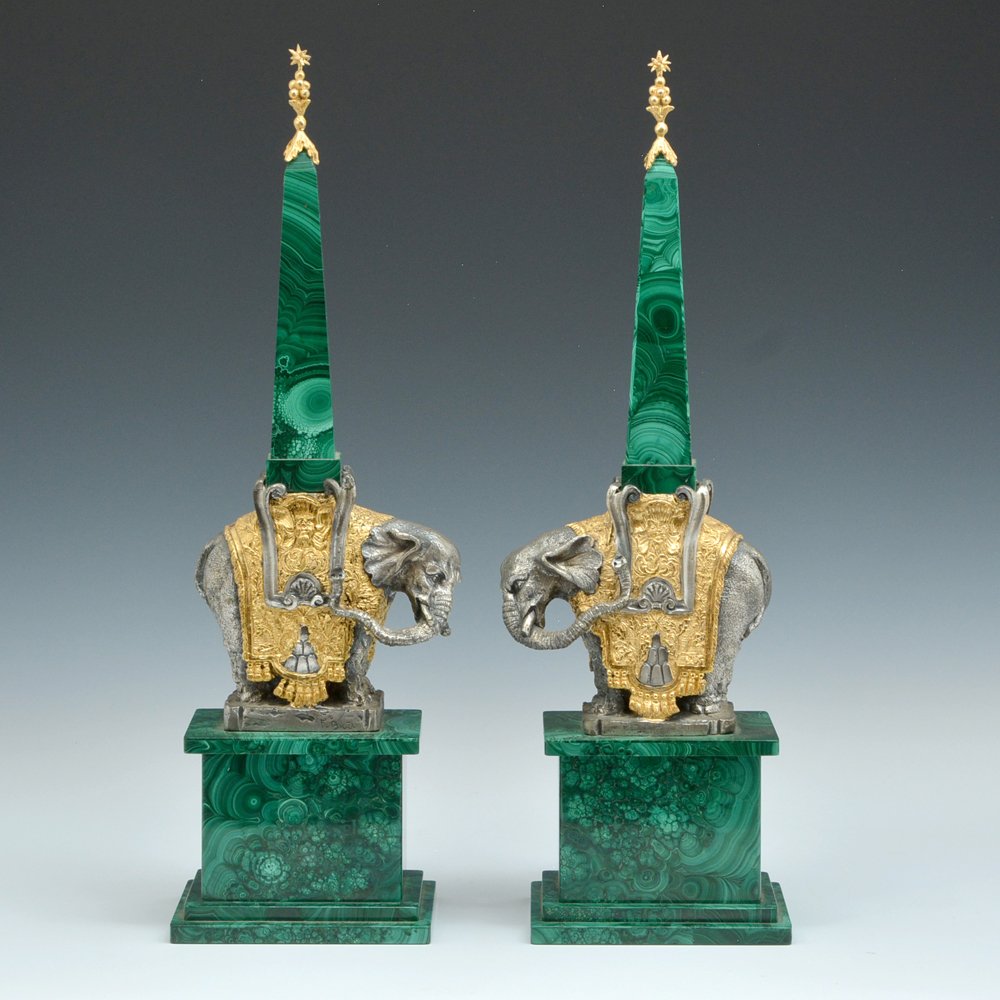 Malachite Obelisks, gilt & silver gilt elephants, 20.5": Pair of Malachite Obelisks with gilt & silver gilt elephants, 20.5" tall. Very good condition.