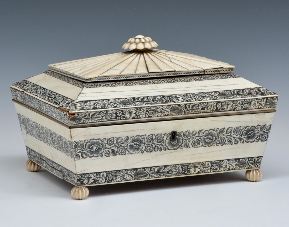 Anglo Indian Vizagapatam Sewing Box, 13"w: Anglo Indian Vizagapatam Sarcophagus Form Sewing Box, late 18th c., hinged lid with black engraved grape vine border, lift-out fitted interior with compartments and pin cushions, on ball feet, 8.5"h x