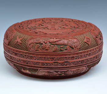 Large Chinese Cinnabar Box, 16" dia., Ming/ Qing: Large Chinese Carved Cinnabar Box, the 5-claw Dragons, Daoist figure and Chinese character for "Spring" on top, deeply carved, with 4 scenic figural medallions above and below and ornate border connec