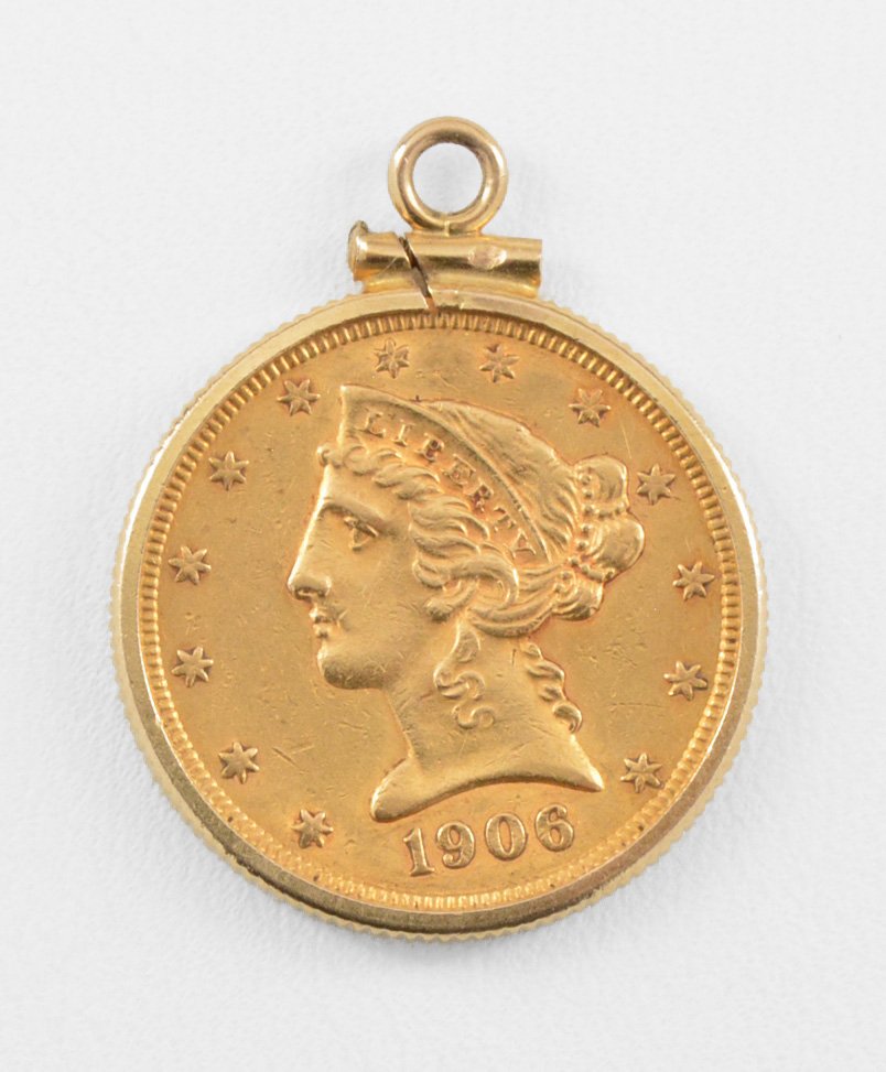 1906 Liberty 5 Dollar Half Eagle Gold US Coin: 1906 Liberty 5 Dollar Half Eagle Gold US Coin with coin bezel.