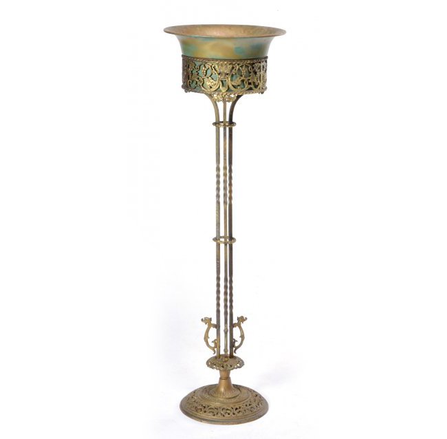 Oscar Bach style iron & brass floor standing jardiniere: Oscar Bach style hammered iron and brass floor standing jardiniere with grape, gargoyle and mask decoration. 46" tall in very good condition.