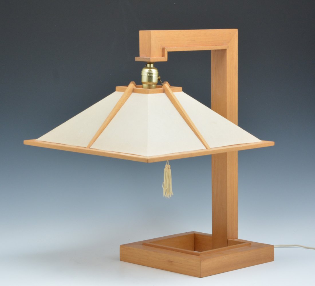 Frank Lloyd Wright Taliesin Table Lamp, mahogany: Frank Lloyd Wright Taliesin Table Lamp, mahogany, 21.75"h x 15.5"w x 18.5"d. Very good original condition. From the estate of John H. Howe, architect and 32 year chief draftsman for Frank Lloyd Wright
