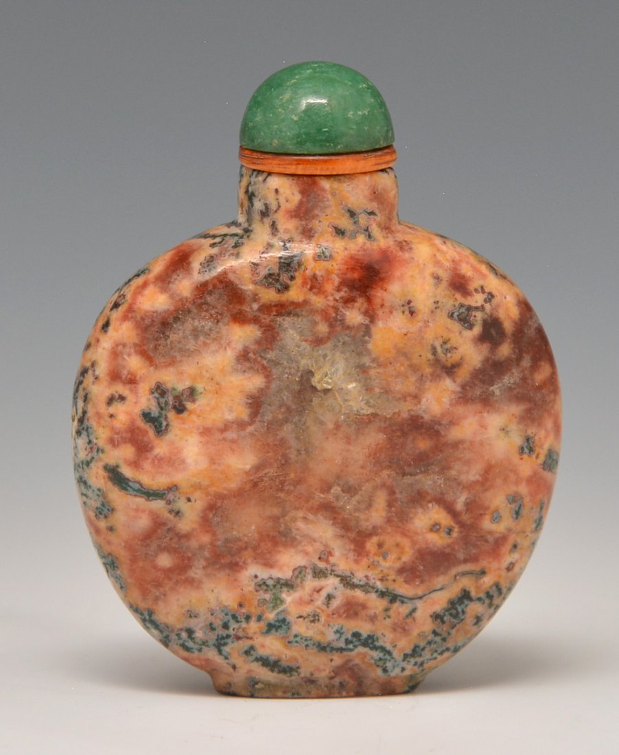 Agate snuff bottle, variegated natural colors: Agate snuff bottle, plain with variegated natural colors, well hollowed. Height with antique stopper is 2¾ inches. Purchased from Yuan Feng & Co. Ltd., Hong Kong, China 9/29/1970