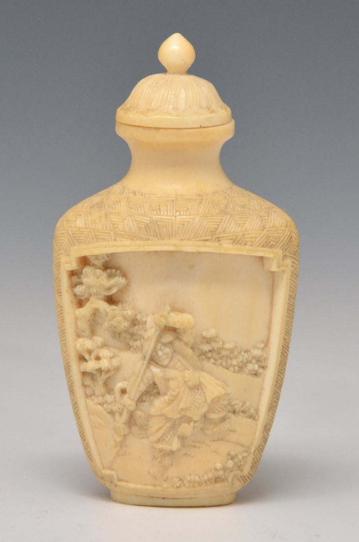Carved snuff bottle, Warlord, Qing Dynasty: Carved snuff bottle with the front panel showing warlord standing erect in boat with spear over shoulder. Back panel shows warrior with spear. Finely carved. Height 2 3/4 inches. Antique Hypermarket, 