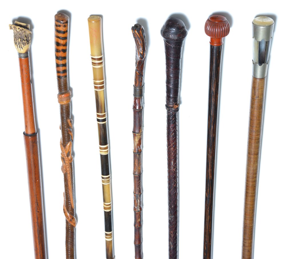 Grouping of 7 Walking Sticks, Antler, Horn & Leather: Grouping of 7 Walking Sticks, Antler, Horn, Leather, etc. Tallest 36.25"