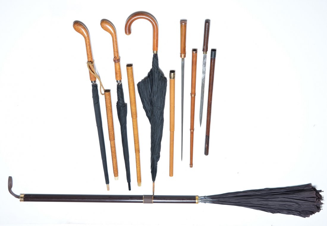 Grouping of 6 Trick Canes, 4 Umbrella and 2 Stickers: Grouping of 6 Trick Canes, 4 Umbrella and 2 Stickers, Tallest 35"