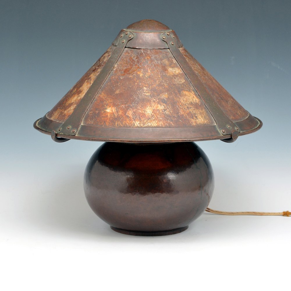 A Dirk Van Erp Hammered Copper & Mica Lamp: A Dirk Van Erp Hammered Copper & Mica Lamp with closed box windmill ''San Francisco" stamp with D'Arcy Gaw ghost signature. The conical riveted four-panel shade with rolled rim supported on curved arm