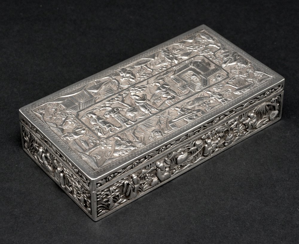 Chinese Silver Cigarette Box, mark at bottom: Chinese Silver Cigarette Box, mark at bottom, rectangular with hinged cover with overall chasing and repousse of figures and immortals in a pavilion landscape, 5.5" x 3" x 1.25", very good condition. 