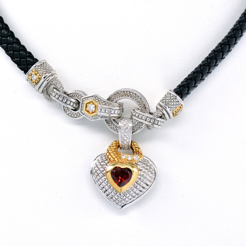 Judith Ripka Diamond & Garnet Necklace: Judith Ripka necklace, 18kyg and sterling; flat, braided black leather choker featuring a diamond and garnet heart pendant. The pendant is detachable and the choker can be worn alone, featuring a .10 