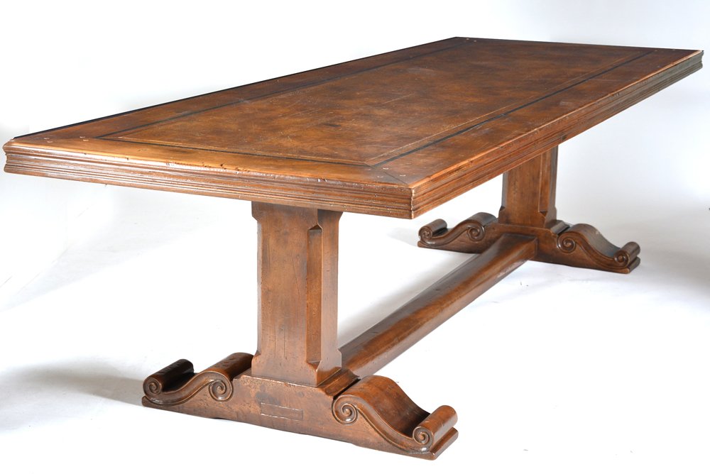 French Walnut Trestle Table, 9' 6": French Walnut Trestle Table with burl walnut center panel and inlaid ebony banding above a scrolled pedestal and stretcher base, 30" high x 9' 6" long x 40" deep, very good condition.