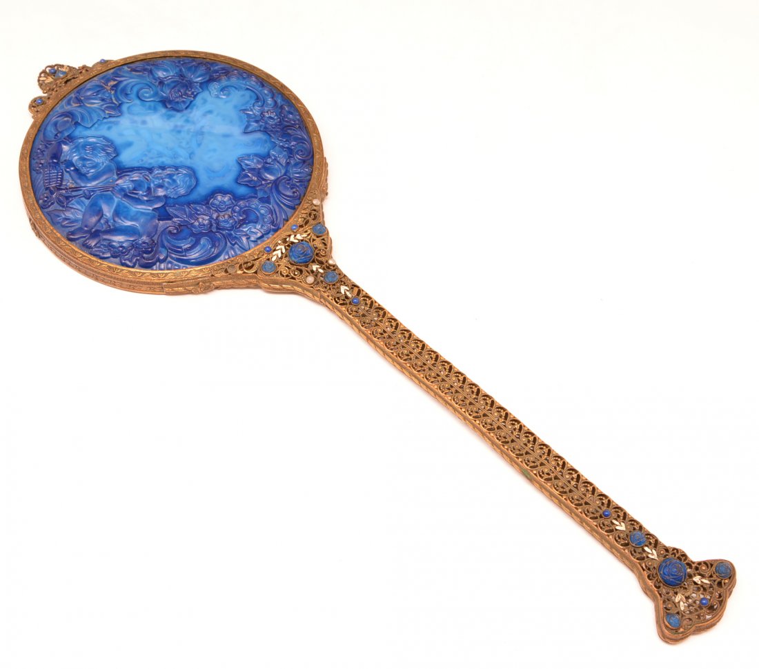 French Art Nouveau Hand Mirror, cobalt glass: French Art Nouveau Hand Mirror, with cobalt glass carved with cherubs and flowers mounted in an openwork brass frame, 18.25" long x 6.25" diameter, very good condition.