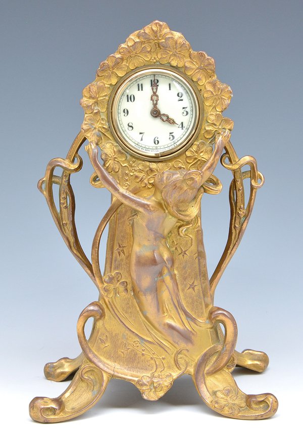New Haven art nouveau mantel clock, 12"t: New Haven art nouveau mantel clock with porcelain dial and semi-nude maiden, 12 1/2"t. Good original condition with wear to finish commensurate with age.