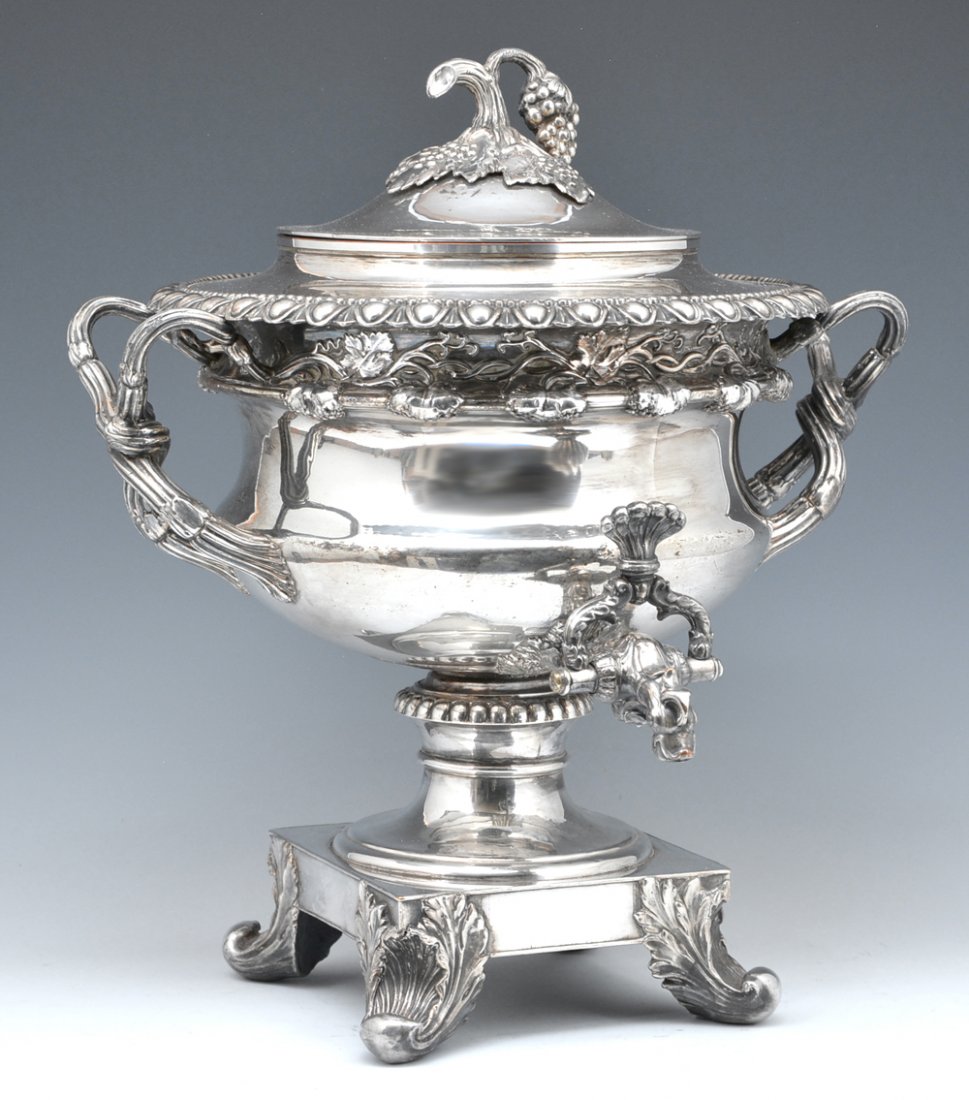 Silverplate wine muller with grape and leaf design: Silverplate wine muller with grape cluster and leaf knop, grape vine handles and decoration, mythical beast spout, all ending in platform base with acanthus leaf feet. The interior is fitted with the 