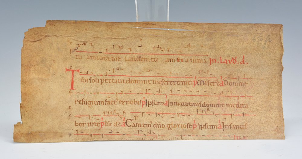 11th/12th c Italian liturgical music parchment fragment: 11th/12th c Italian liturgical music fragment on parchment, from Theodore Tausky, autograph dealer, Paris. 5 1/8" x 11 1/8".