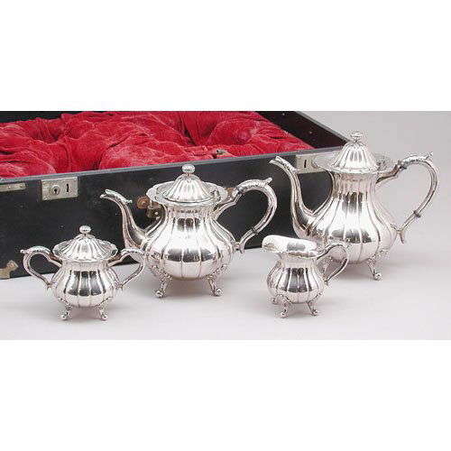 Plaza House Sterling Tea & Coffee Set.: TEA & COFFEE SERVICE. Sterling four piece coffee & tea service with coffee pot, teapot, sugar & creamer by Plaza House with fitted box. 9" tallest. In very good original condition.