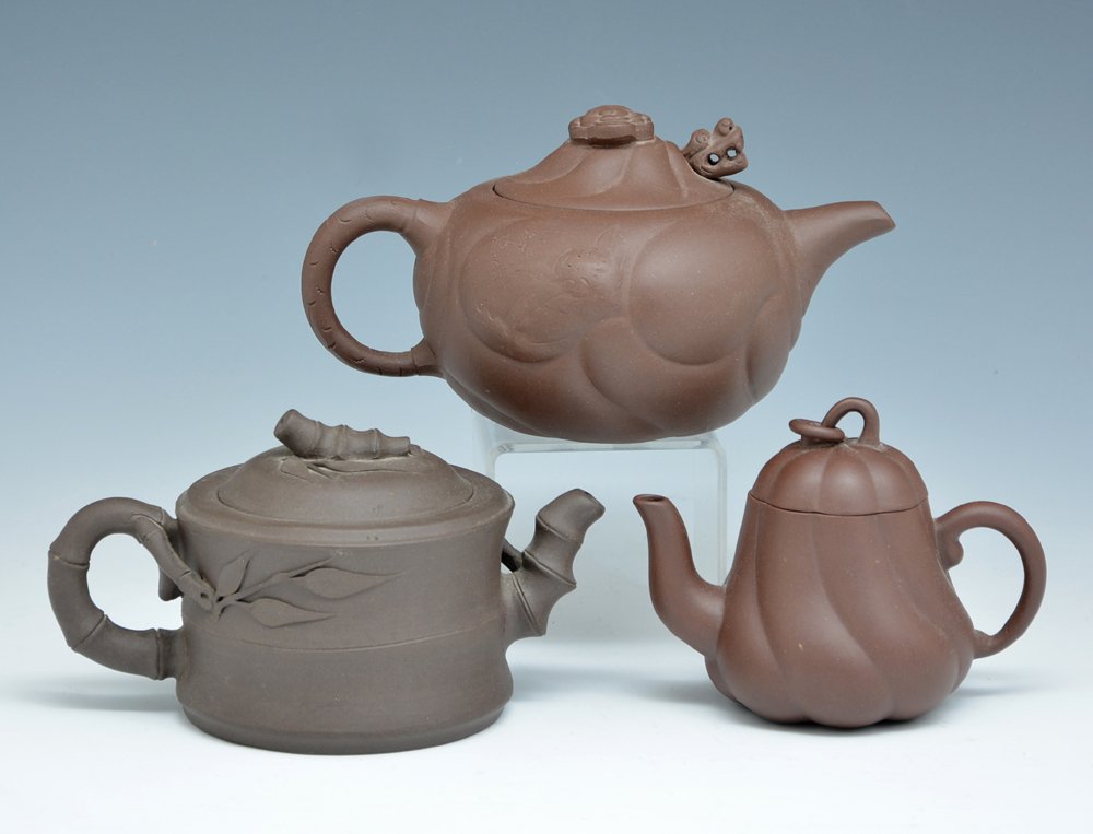 Chinese Yixing Zisha salt glazed clay teapots (3): Chinese Yixing Zisha salt glazed clay teapots (3), one signed, largest 7.5" w