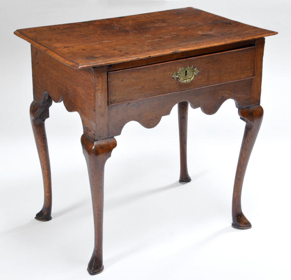 Queen Anne Oak Work Table, 18th/19th c: Queen Anne work table, oak with cut out skirt and single drawer on cabriole legs ending in spade feet, 18th/19th c, 27 1/2"t x 28"w x 18"d. Good condition