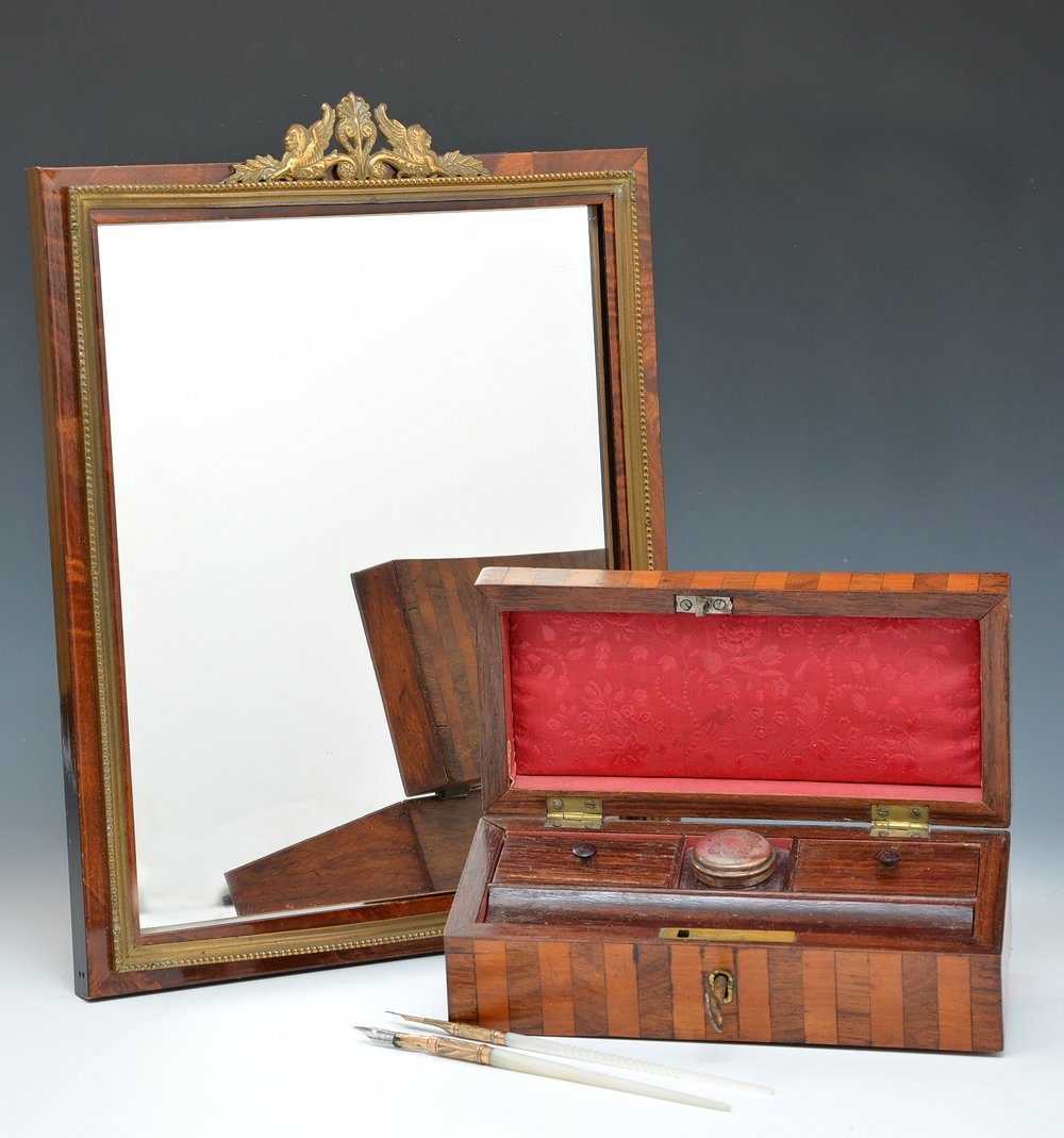 Mirror in burl frame and writing case: Mirror in burl frame with neo classical ormolu mount featuring griffons and a traveling writing case with marquetry veneer. Locking case has fitted interior with three covered compartments, inkwell wi