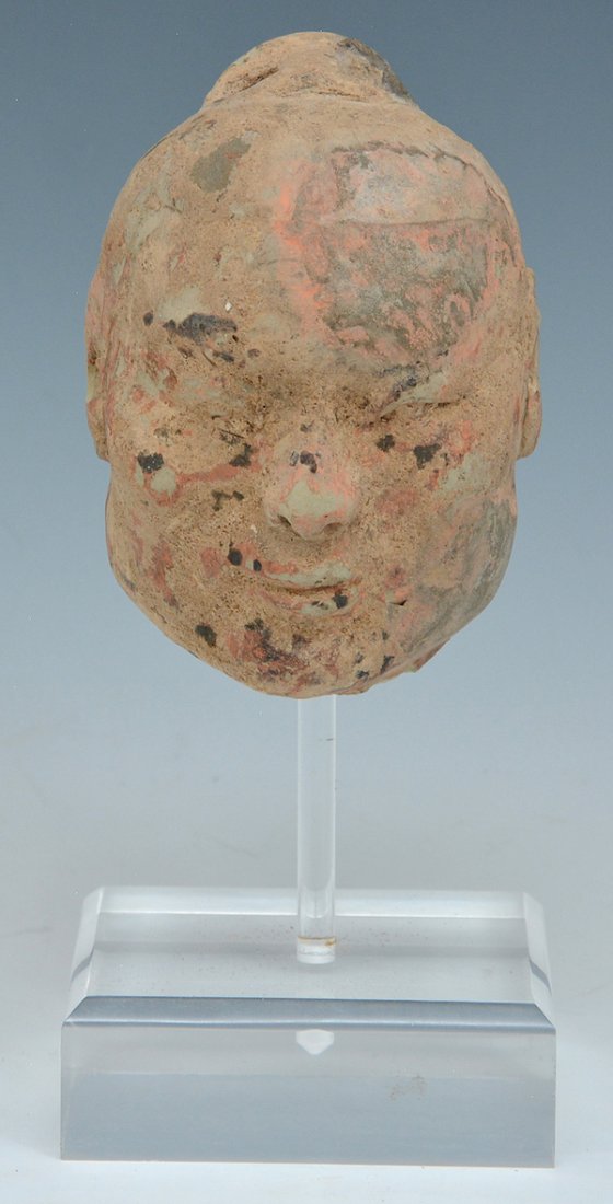 Chinese Han dynasty Ceramic Head: Chinese Han dynasty ceramic head on plexiglass stand. Head appx 3 3/4"h, on stand 6 3/4".