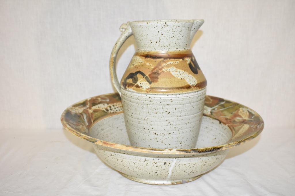 Bunny Mc Bride Pottery Pitcher and Bowl: Well known Iowa City artist. Both pieces signed. Bowl is 17 3/4" x 5 1/2". Pittcher is 13" x 8". Local pick up or shipping outsourced.