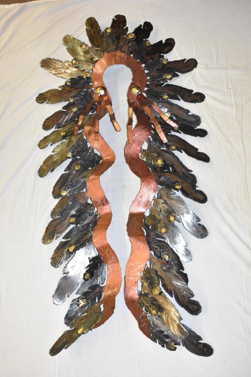 Metal Art Native American Headdress By Jay Tschudy: Copper, brass and steel headdress art sculpture. Southern California artist with only a left hand who was a descendant of the Blackfoot Native Americans. 53" x 27" . Local pickup or shipping outsource